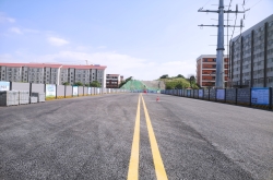 托子沖南路主幅路通車，新學校旁拉通了一條便民路